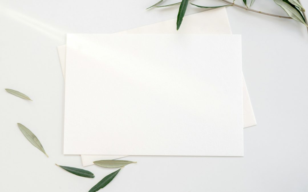white printer paper with green leaves